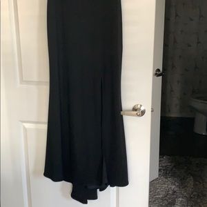 Sleeveless black evening dress.